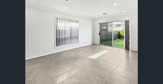 Near-New Spacious Five-Bedroom Family Home with Multi-Room & Large Block - Photo 1