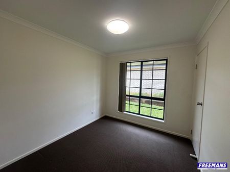 Modern Fully Fenced 4 bedroom Home - Photo 3