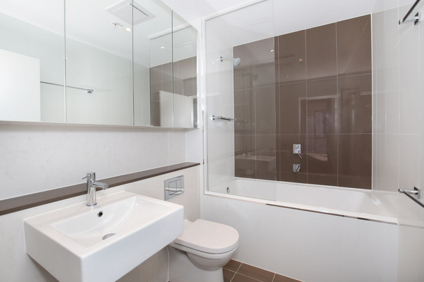 LUXURY LIVING AT BURWOOD SQUARE - SEMI-FURNISHED 2-BEDROOM APARTMENT WITH BREATHTAKING VIEWS - Photo 1