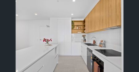 Brand New 2 Bedroom Apartment with Multi-Purpose Room - Photo 2