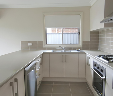 LOW MAINTENANCE LIVING - Photo 1