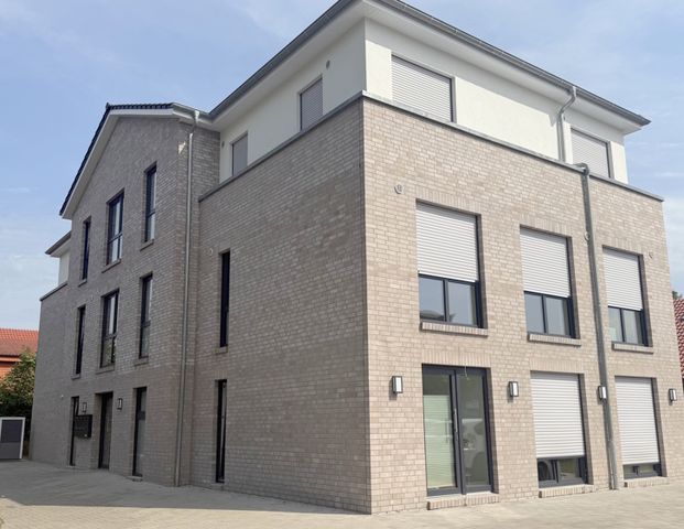 Neuwertige 2-Zimmer-Dachgeschosswohnung mit großer Dachterrasse in zentraler Lage von Wiefelstede - Foto 1