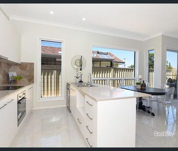Stylish, Low-Maintenance Townhouse in Sought-After Rangeville - Photo 6