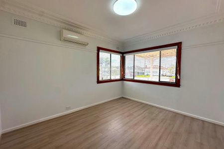 PARTIALLY RENOVATED FAMILY HOME - Photo 4