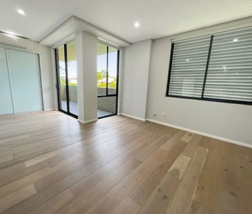 Modern two bedroom unit - 20% below market rent - Photo 2