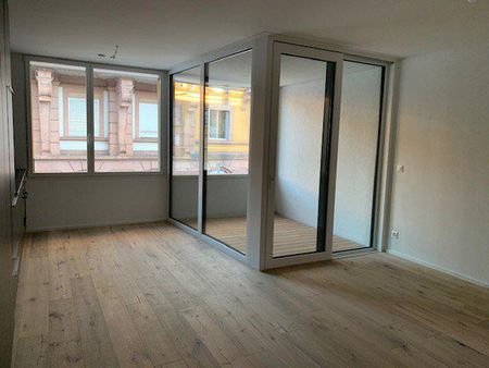 APPARTEMENT AVEC ENCADREMENT - Place de la Gare 4a, appartement de 2.5 pièces - Photo 2