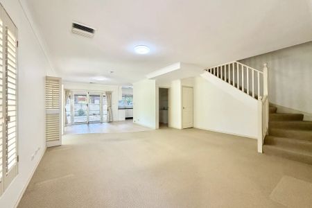 Elegant Corner Townhouse with Courtyard Living in a Prime Strathfield Location - Photo 2