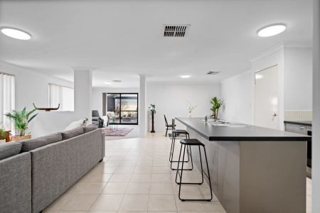 Immaculate 4x2 Family Home with Multiple Living Areas - Photo 2