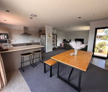 Charming 3BR Home w/ Garden & Deck! - Photo 5