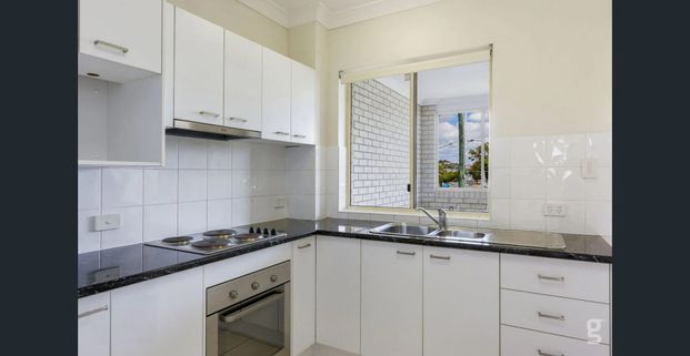 LOW MAINTENANCE WITH STUDY & COURTYARD - Photo 1