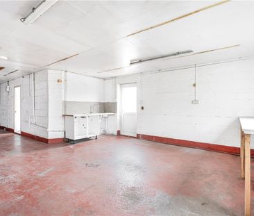 A 3 bedroom bungalow with a large garage and driveway parking in We... - Photo 2