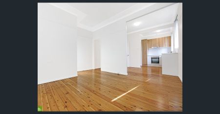 Renovated Home with Lawn Maintenance Included! - Photo 3