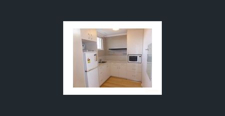 Top -Floor One-Bedroom Unit - Available Now - Photo 4