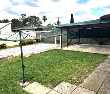 CONVENIENTLY LOCATED FAMILY HOME - Photo 3