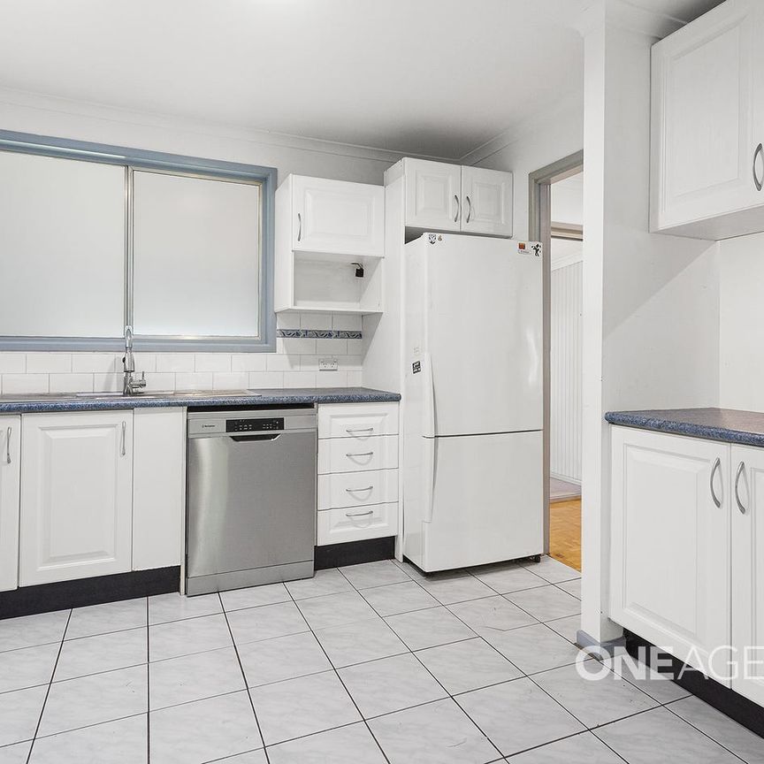 SPACIOUS FAMILY HOME WITH MULTIPLE LIVING AREAS - Photo 1