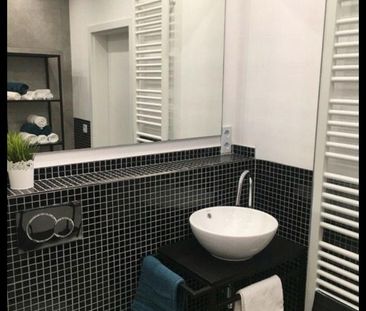 Stilvolle 1,5-Zimmer-Wohnung mit großem Balkon - Photo 4