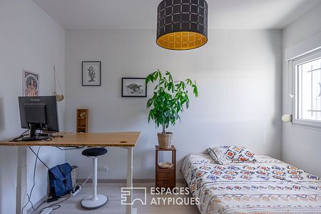 Bel appartement en duplex aux volumes généreux dans le bourg de Indre - Photo 2