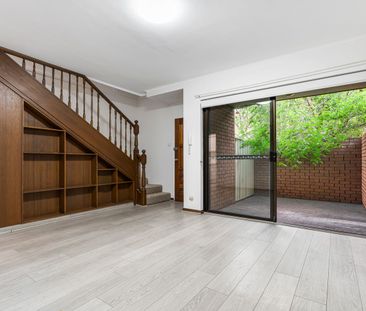 Freshly Painted Two Bedroom Townhouse - Photo 1
