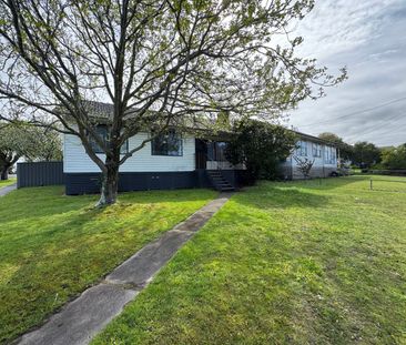 Neat Three-Bedroom Home in Prime Location - Photo 3