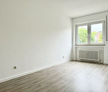 Drei-Zimmer-Wohnung mit saniertem Bad und neuem Fußboden - Foto 5