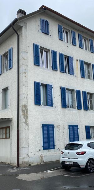Appartement de 5 pièces au 1er étage avec balcon situé au centre du village - Photo 1