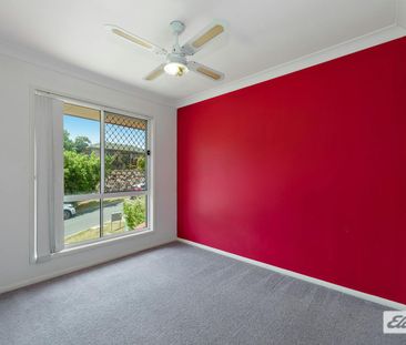 Spacious Family Home with Multiple Living Areas & Air Conditioning - Photo 5