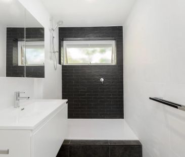 SUNLIT SANCTUARY IN THE HEART OF SANDY VILLAGE - Photo 3