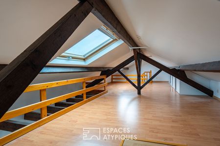 Duplex atypique en dernier étage - Photo 3