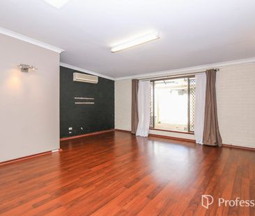 Charming 3-Bedroom, 2-Bathroom Home in a Prime Location! - Photo 2