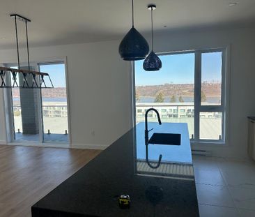 magnifique 5 1/2 neuf vue sur le fleuve - Photo 4