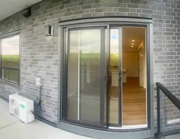 Charming 2 bedroom, 920 sqft (plus 100 sqft patio) | 20295 Seton Way Southeast, Calgary - Photo 1