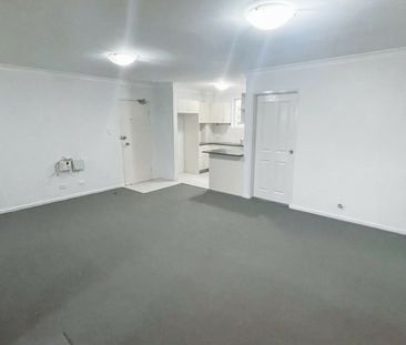 WELL PRESENTED GROUND FLOOR 2 BEDROOM UNIT! - Photo 4