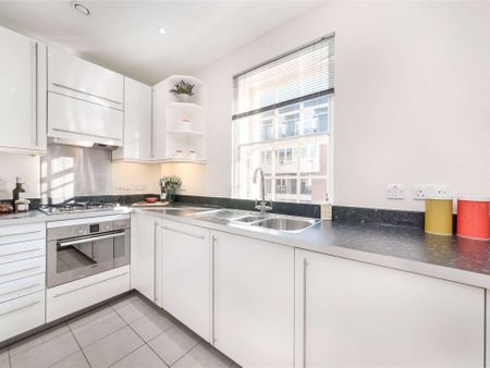 A luxuriously appointed two bedroom apartment in this converted period building in Belgravia benefitting from wood flooring and contemporary style furnishing. - Photo 5