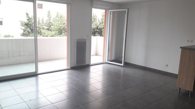 location Appartement T3 DE 68.38m² À MARSEILLE - Photo 1