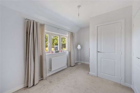 Charming mid-terrace home offering versatile living space, private garden, off-street parking and car port - Photo 3