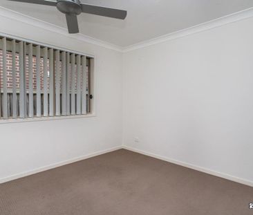 Spacious 4-Bedroom Home with Low-Maintenance Yard - Photo 5