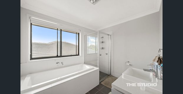 Spacious Family Home with Multiple Living Areas & Modern Comforts - Photo 1