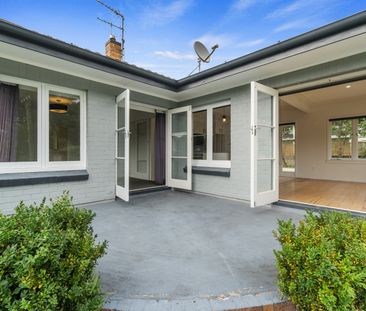 This beautifully presented three-bedroom, two-bathroom home offers ... - Photo 2