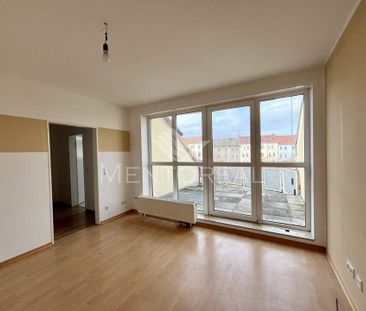 Gemütliche Dachgeschosswohnung mit großer Sonnenterrasse - Foto 1