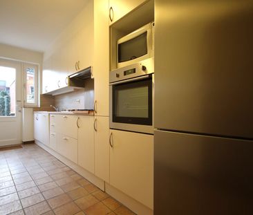 Ruime woning met 3 slaapkamers en tuin midden in het centrum - Photo 3