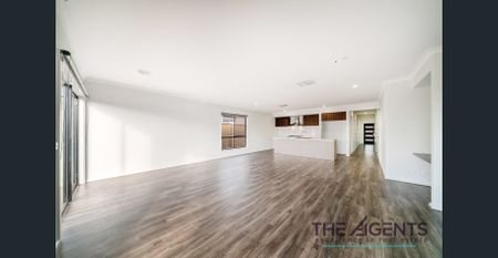 Creek-Facing 4-Bedroom Home with Dual Living Spaces - Photo 2