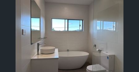 Modern Family Living | Spacious 3-Bedroom Home - Photo 2