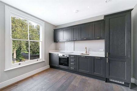 *3D Viewing Tour Available * A stunning high spec top floor flat in the heart of Shepherds Bush - Photo 4