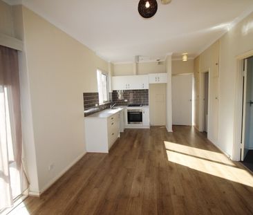 Open the Door to Trendy, Low-Maintenance Living in South Plympton - Photo 1