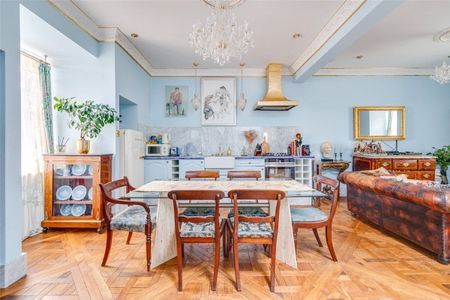 A unique double-aspect fourth floor flat (without lift), lovingly refurbished by the owners offering a bright and spacious Chelsea pied-a-terre. Minimum Tenancy Length: EPC rating E | Council Tax Band G - Photo 5