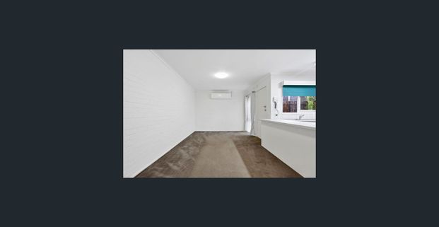 Light-Filled and Low-Maintenance Two-Bedroom Unit - Photo 1