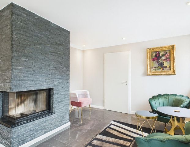 Exklusives und energieeffizientes Einfamilienhaus mit Pool und Garten - Foto 1