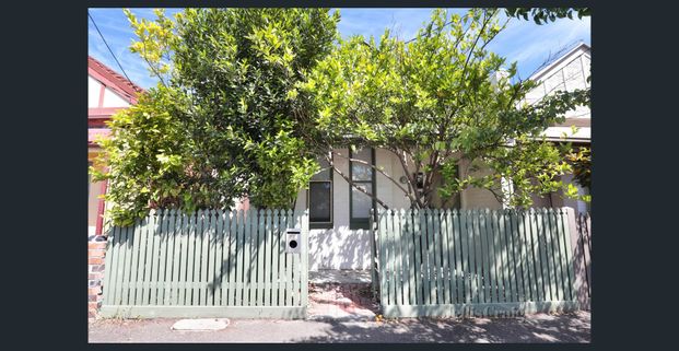 Charming Brick Edwardian with Modern Comforts and a Sun-Filled Courtyard Retreat - Photo 1