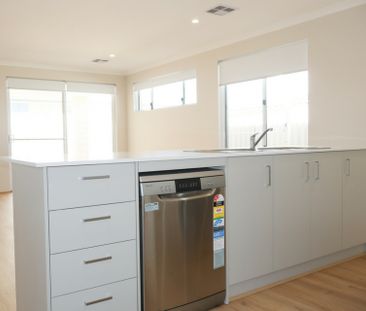 Live the Coastal Lifestyle in Brand New Four Bedroom Home! - Photo 2