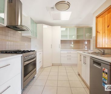 Charming 4-Bed, 2-Bath Home with Modern Upgrades & Spacious Backyard - Photo 4